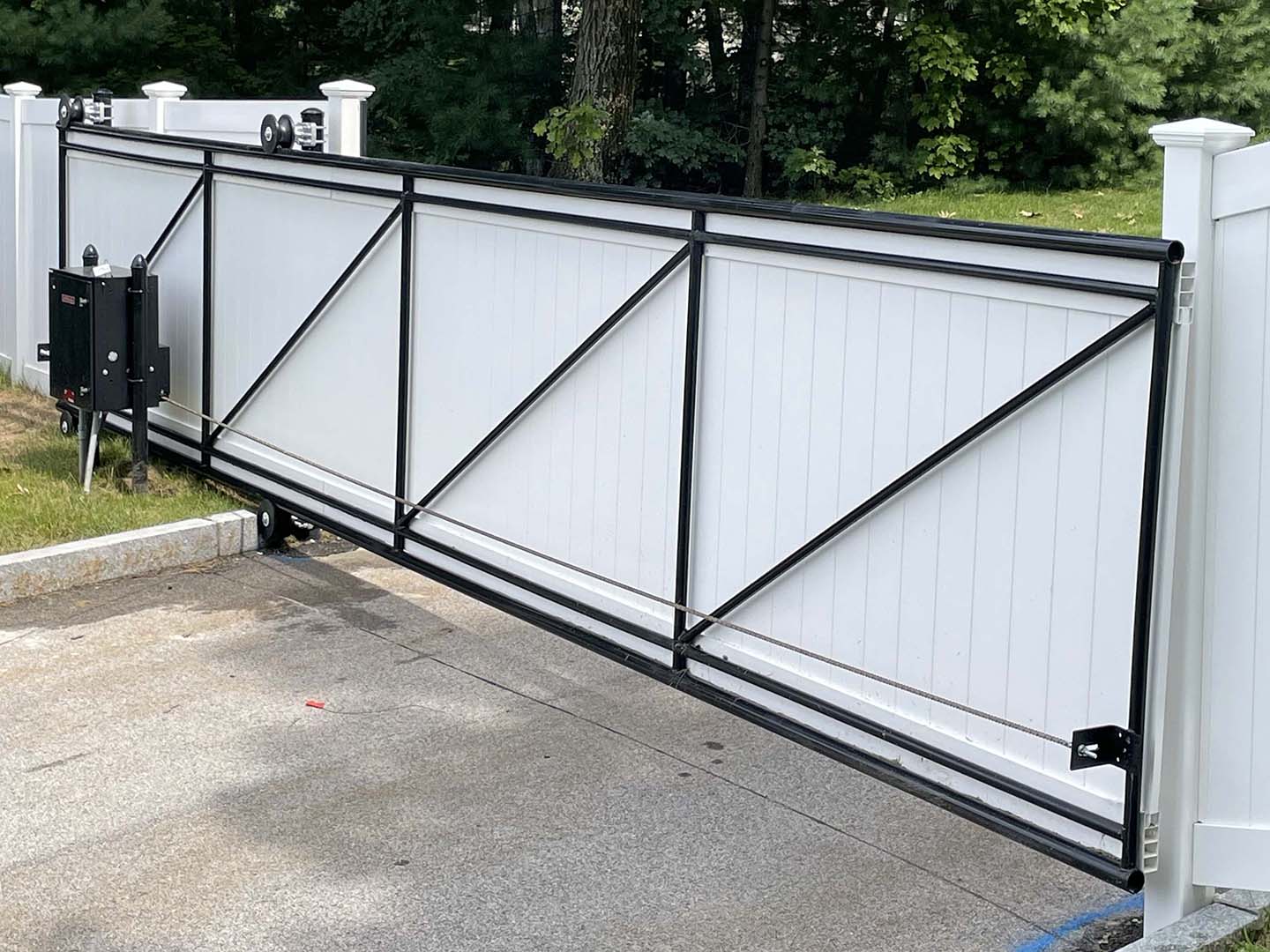 Custom driveway gate installed in Merrimack Valley, Massachusetts
