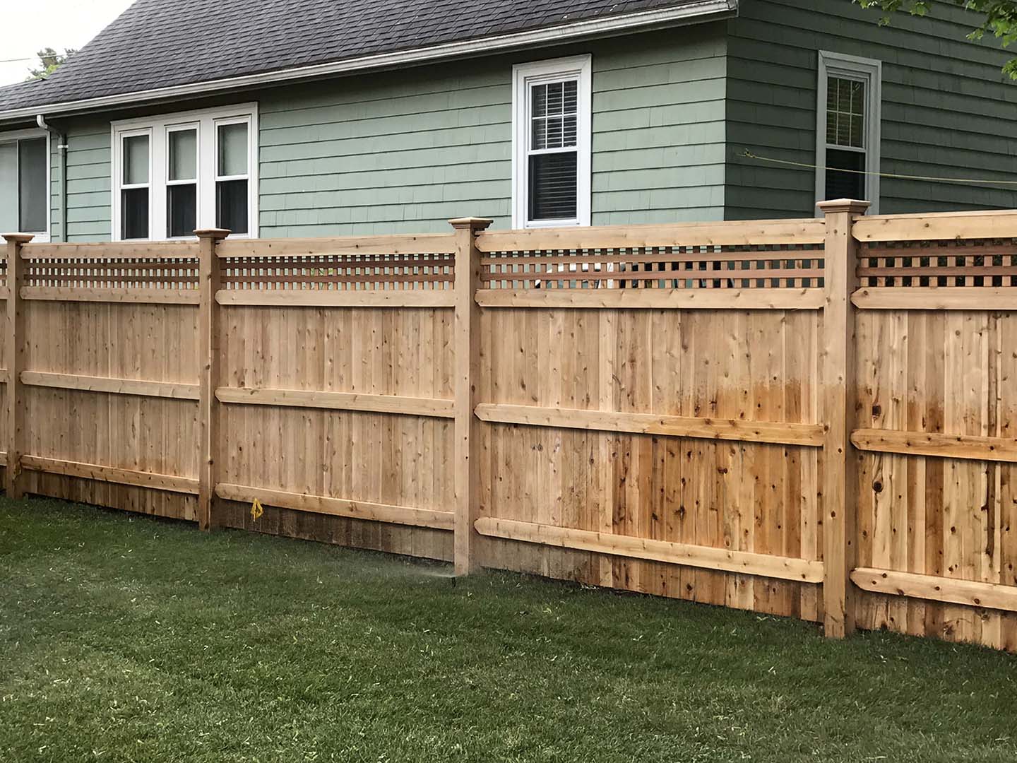 Cedar arbor and matching fence built in the Merrimack Valley, Massachusetts