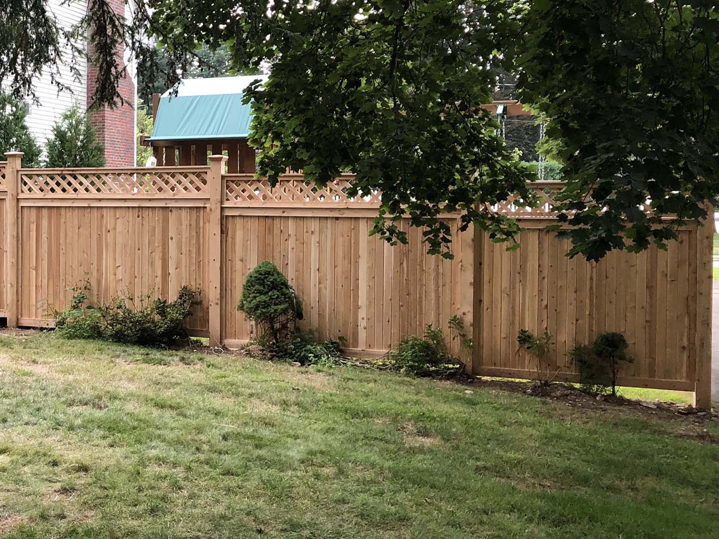 Spaced picket cedar fence around a front yard, Merrimack Valley MA
